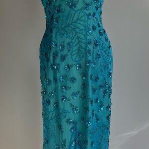 Sexy, beaded asymmetrical Cache dress